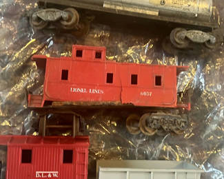 Lot 149: Lot of Three Lionel Post War Plastic Cars, And Caboose