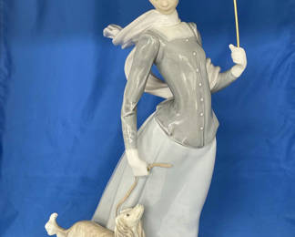 Lot 56: Lladro Lady with Shawl Parasol Dog 4914