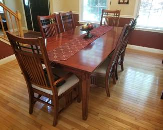 Broyhill dining set with leaf seats 6; includes custom table pads (not shown)