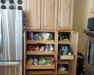 Cabinetry detail: pantry features pull-out shelves