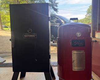 2 Smokers, one electric (hardly used) the other is charcoal and is BRAND NEW!