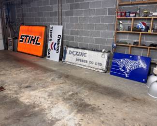Killer signs! Stihl light up cabinet that the orange really pops! Chevron original, OLD define Rubber Co from Manchester UK (be sure and check the pic on the back of the sign when you're there in person, believed to be original sign from an 1800's factory!)