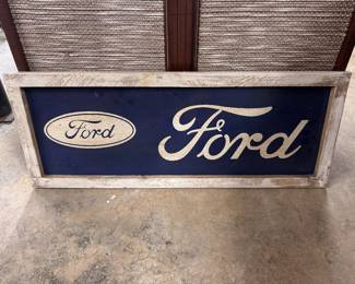 Framed metal Ford sign