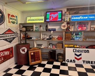 Texaco Lubester, Buddy L trucks, Metal Tonka Tractor, crates, & various oil cans. Many cans still sealed and never used!