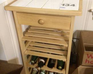 Tile top table with drawer & wine rack