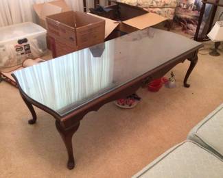 Coffee table with glass for protection