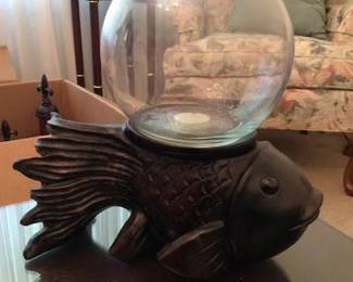 Wooden fish with fish bowl