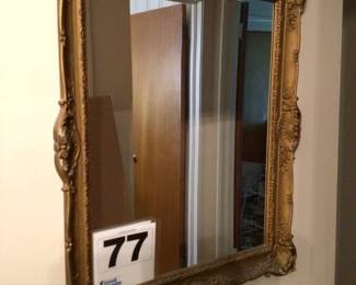 Wall mirror (dull gold in color)
