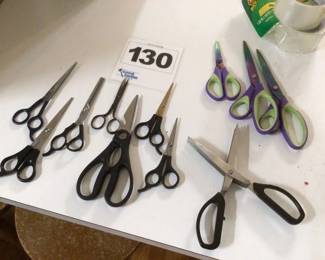 Box full of miscellaneous scissors