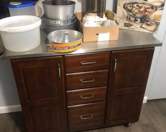 Stainless steel top and on rollers!