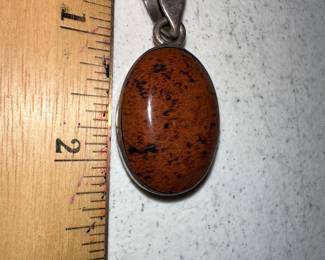 2 Sided Pendant Brown and Black $10.00