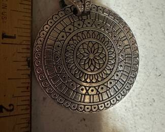 Embossed Pendant $6.00