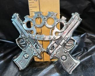 Guns and Knuckles Belt Buckle $6.00