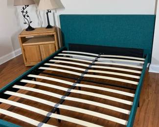 Teal Upholstered Platform Queen Bed Frame with table and lamps
