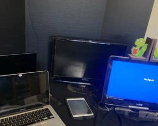 MacBook Pros, iPad, Samsung Monitor  A Vizio Tv