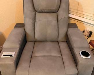 Not your average recliner! Power recline • Power headrest • Hidden storage • Cup holder • USB charging • Wireless charging • Illuminated controls