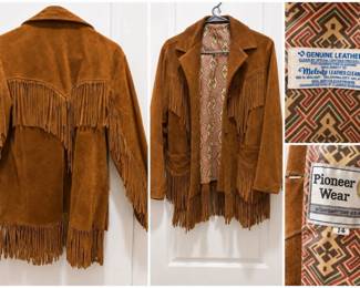 Vintage Pioneer Wear leather fringe jacket with Southwestern lining.