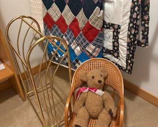 Vintage Teddy Bear in Wicker Chair with Quilts and Brass Magazine Rack