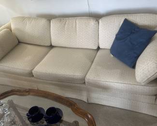 Upholstered sofa and matching loveseat