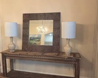 Distressed Wood Console Table with Two Ceramic Lamps and Ornate Mirror