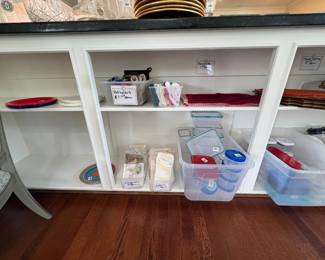 Assorted Kitchen Linens and Plastic Storage Containers