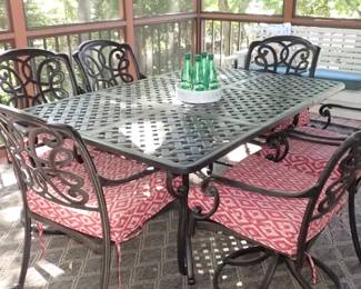 IRON OUT DOOR TABLE AND CHAIRS (6)