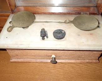 ANTIQUE SCALE IN GLASS BOX