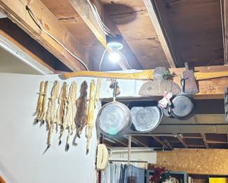 Antique Ax's, Mink Pelts, and Cast Iron