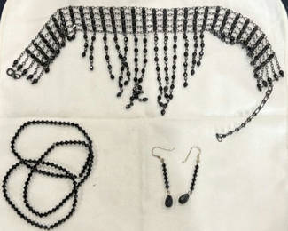 Lot 209: Black bead jewelry set (fringe necklace, geometric bead necklace, bracelet, and drop earrings)