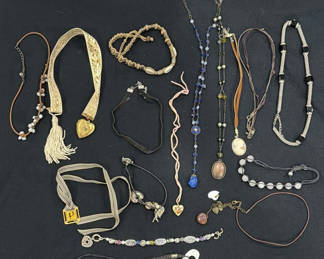 Lot 201: Assorted Jewelry Collection: Necklaces, Bracelets, and Charms