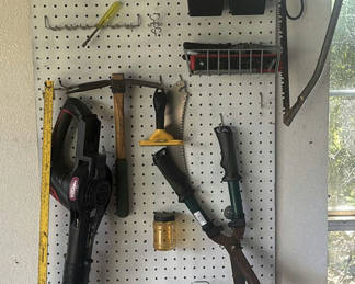 Lot 101: Pegboard with Assorted Hand and Yard Tools