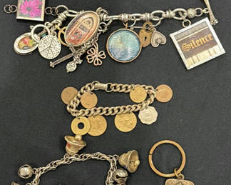 Lot 207: Assorted Charm Bracelets with Coins and Pendants