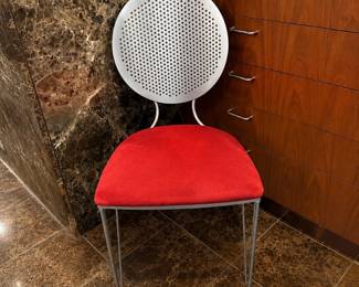 Contemporary perforated metal chair