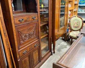 This cherry secretary bookcase in the foreground is really special. Measures 45" w by 65" t by 16" d.