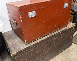 Red chest, 28" w by 16" t by 16" d. Black chest, 40"w by 20" d by 18" t.