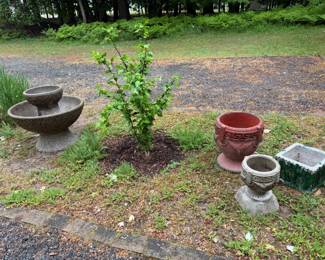 Large stone water fountain 30" dia by 27" tall by 12" deep, top bowl is 15" dia. Excellent condition.  Red cement planter, 17" t by 15" dia.  White 2 pc planter 13" t by 9" dia.  Square green planter 11" sq by 9" t. All in good condition.