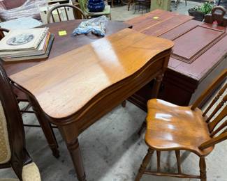 Game Table. Top opens up and swivels to accommodate 4 chairs. Great space saver for extra seating . 