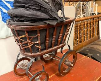 Doll buggy.