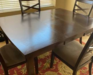 Dining Table And Four Chairs And Rug