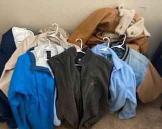 Mens And Women Jackets With A Pair Of Rubber Boots
