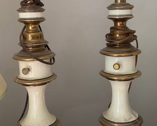 vintage Mid-Century Modern table lamps by Stiffel, featuring a distinctive combination of white enameled porcelain and brass.