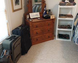 mirrored dresser, luggage, belts, ties, readers
