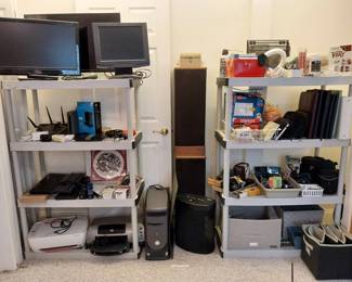 Insignia TV, Harmon Kardon subwoofer, Element TV, Advent speakers, paper shredder, Cannon AF 35M, Vivitar 220 SL