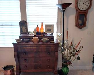 Antique American step back chest of drawers, Seth Thomas wall clock, Tom Tomasek, Mueller Bros amber bottle, Warner’s safe kidney and liver cure bottle, copper fire bucket,