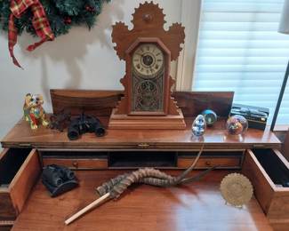 glass paper weights, gingerbread clock, desk