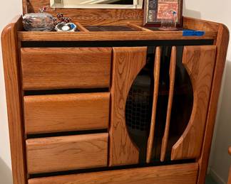 Dresser w/ flip open top with mirror, both sides open for jewelry,  tie, belt storage, 5 drawers & shelves behind glass door front 41”wx18d x 49 h $145