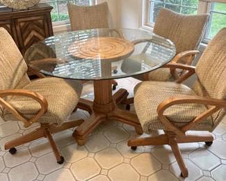 Glass top wood pedestal dining table 48”Rnd x 29.5h  $200; caster wood arm upholstered chairs $65 ea