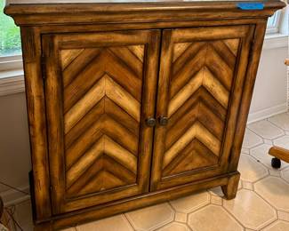 36“ x 12“ D by 36”h solid wood cabinet with inlaid wood Chevron pattern front, 1 center shelf inside $185