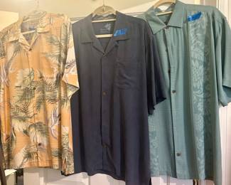 Tommy Bahama collared button-down shirts. Price is marked on each in picture.