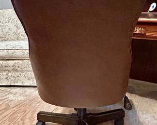 Brown desk chair on five caster Leggs $45